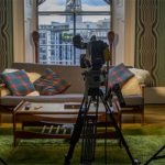 Cameras and a couch set up for live streaming