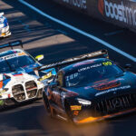 Race cars driving on a race track