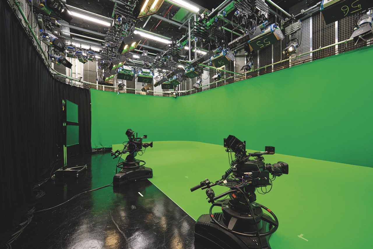 HQ5 green screen studio at Dock 10 MediaCityUK Side view of a green screen room with cameras set up at the front