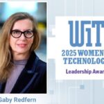 A woman with long hair and glasses next to a logo for an award