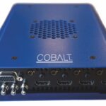 A blue electronic device with many ports at the front