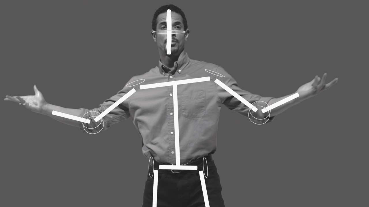 A black-and-white image a man with his arms outstretched. White lines overlay his body